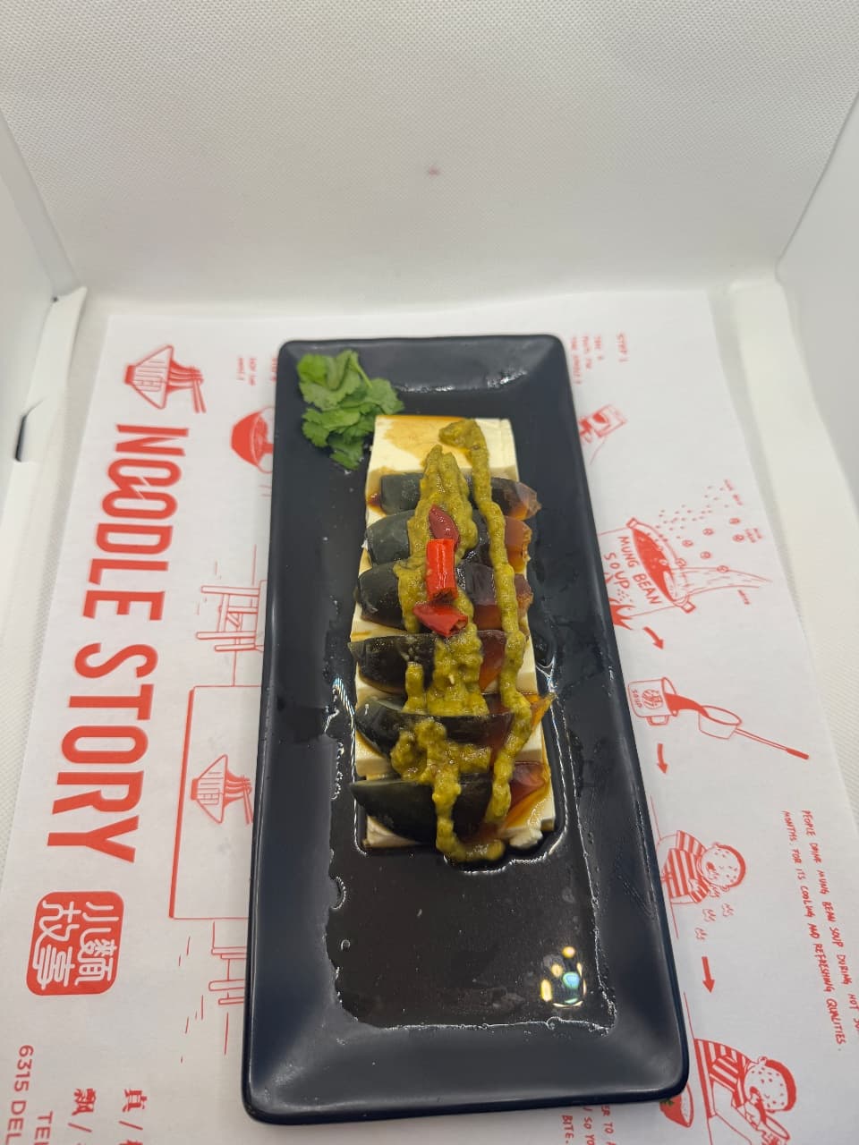 Photo of Thousand Year Egg w.Torched Chili Sauce